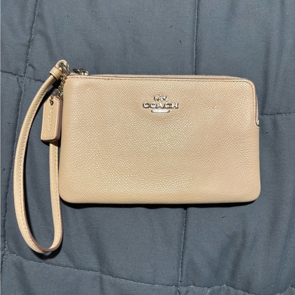 Coach Handbags - COACH Light Pink Pebbled Leather Wristlet